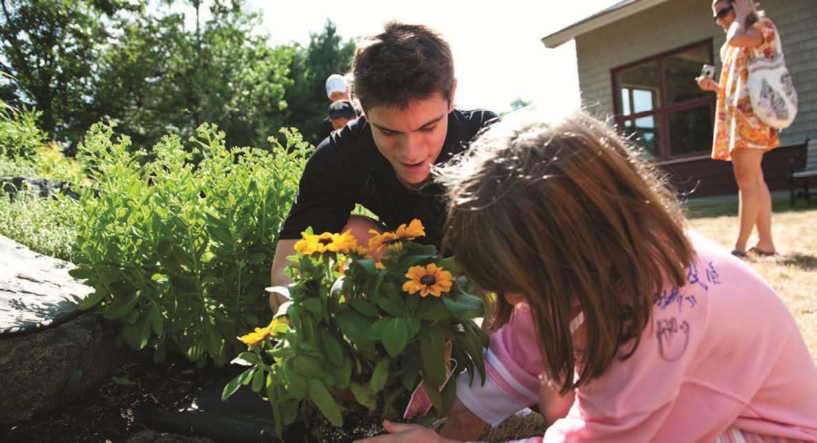 Two people working outside.